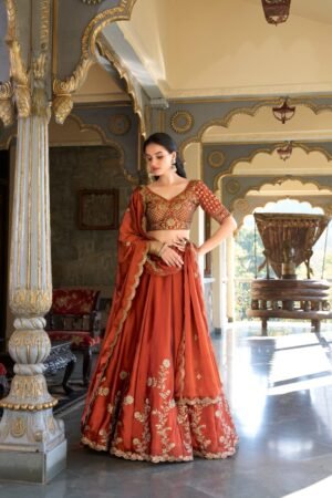 WhatsApp Image 2026-01-13 at 9.18.53 PM (3) Rust Orange Embroidered Bridal Lehenga Choli with Dupatta – Royal Indian Wedding Wear